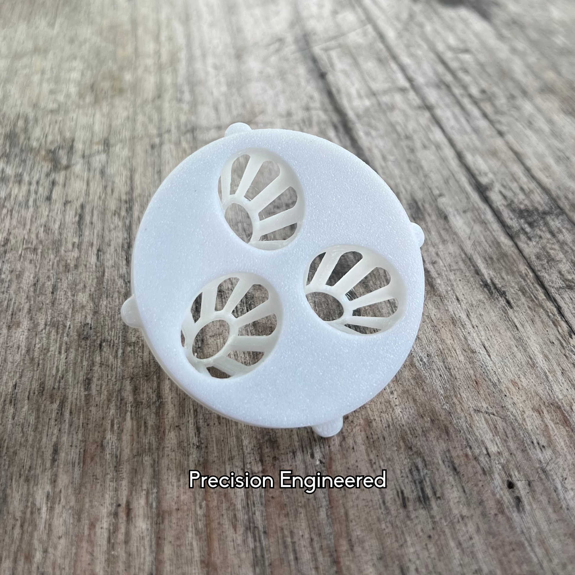 Precision engineered lychee seed net insert designed to support small seeds above water for stable germination.